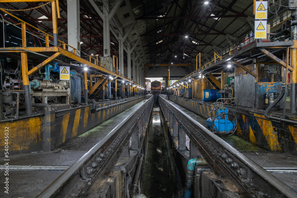 Engineer checking train engine Prepare for repainting for use in train stations. Engineers wear protective clothing and helmets to work safely as standard.
Engineer checking train engine Prepare for repainting for use in train stations. Engineers wear protective clothing and helmets to work safely as standard.