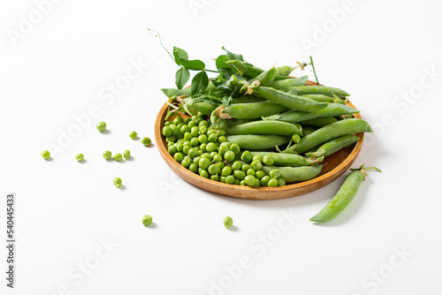 Wallpaper Mural Close up of ripe green sweet peas pods and beans on plate light surface Torontodigital.ca