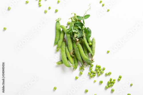 Overhead view of ripe green sweet peas pods and beans