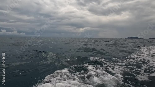 Wallpaper Mural The water splashes from a boat cruising through the sea, from above. Torontodigital.ca