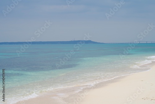 The view of the clear ocean and Irabu Island from Nagamahama Beach