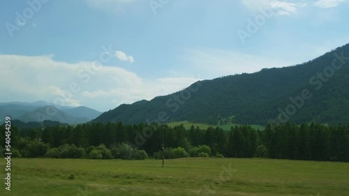 Wallpaper Mural View from moving car window. Picturesque roadside. Summer road trips in mountains. Blur speed background. Torontodigital.ca