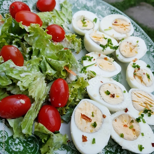 Colorfull low carbohydrate meal with boiled eggs and fresh salad for healthy life. Paleo food. Simple lowcarb meal.