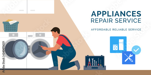 Professional repairman fixing a washer