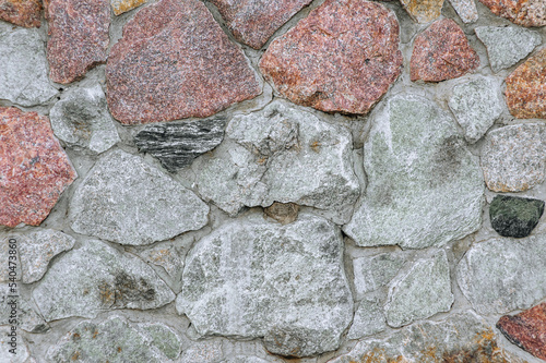Background  texture of a wall made of old stones  cobblestones. Photography of nature.