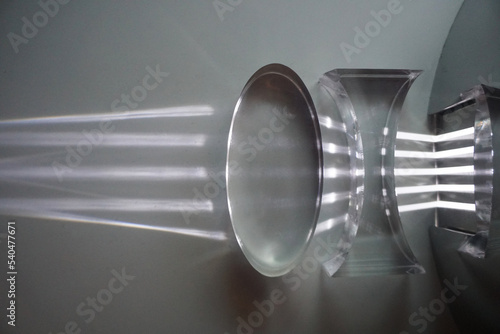 Parallel light is refracted through the convex lens and a concave lens.  Optics physics.