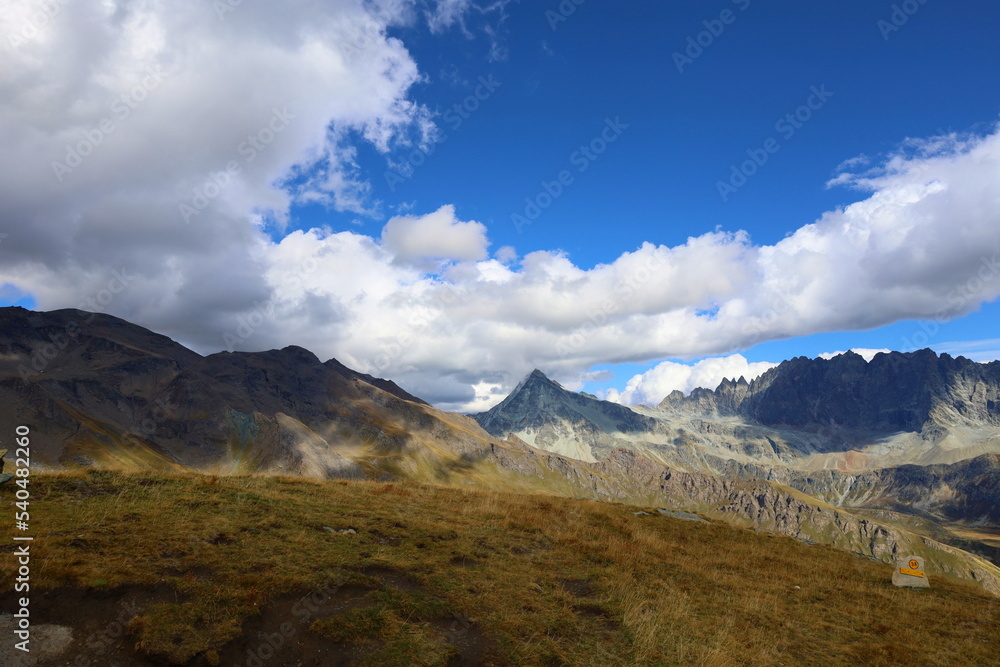 Mountain landscape of long distance hiking trail Tour Des Combins which crosses Switzerland to Italy via Bourg Saint Pierre, Fenetre Durand and Aosta Valley, TDC