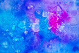 Organic texture made with blue and magenta liquid watercolor on white paper that simulates leaves and concepts of nature and health