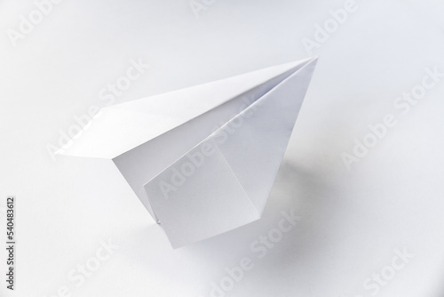 Paper plane origami isolated on a white background