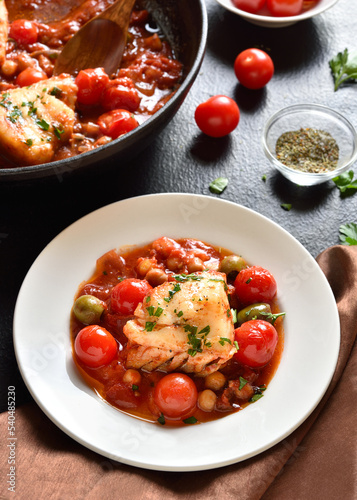 Cod stew with chickpeas, cherry tomatoes and olives
