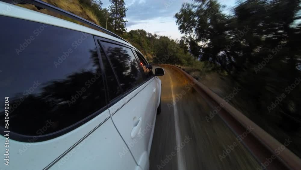 Point Of View Time Lapse Man Driving Car While Exploring On Vacation From Day To Evening - Yosemite, California Point Of View Time Lapse Man Driving Car While Exploring On Vacation From Day To Evening - Yosemite, California