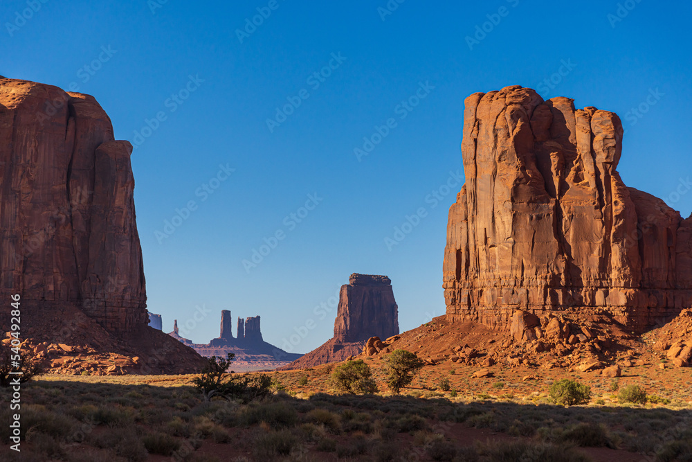 Landscape of Monument Valley in a panoramic view, Navajo tribal park, USA.