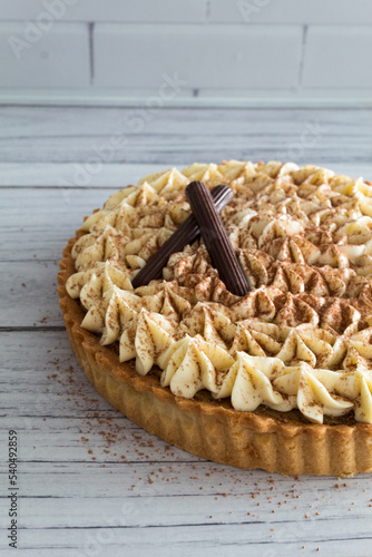 Tiramisu cake with chocolate decorations