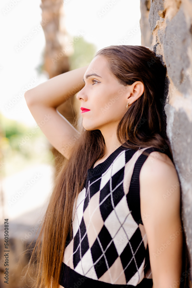 Fototapeta premium Confident young transgender woman looking at camera while posing