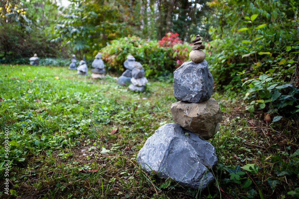 Meylan France 10 2022 stone cairn, stone balancing in a park Meylan France 10 2022 stone cairn, stone balancing in a park
