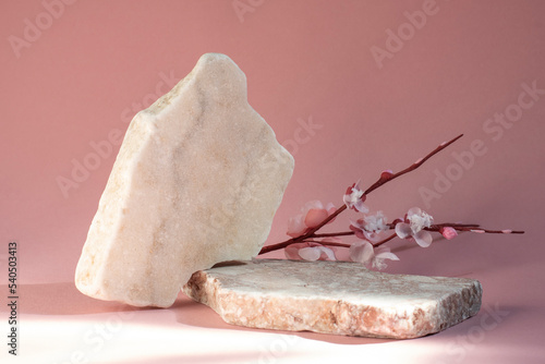 Fototapeta Naklejka Na Ścianę i Meble -  granite podium with pink flowers