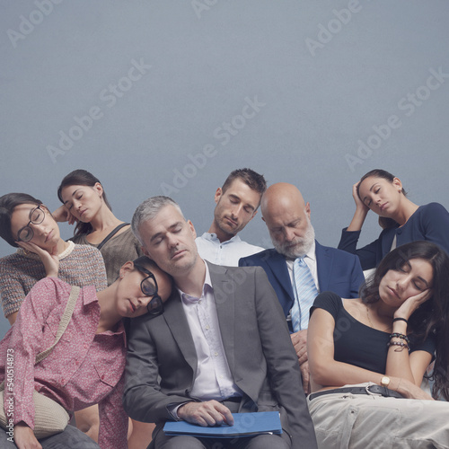 Bored people sitting and falling asleep