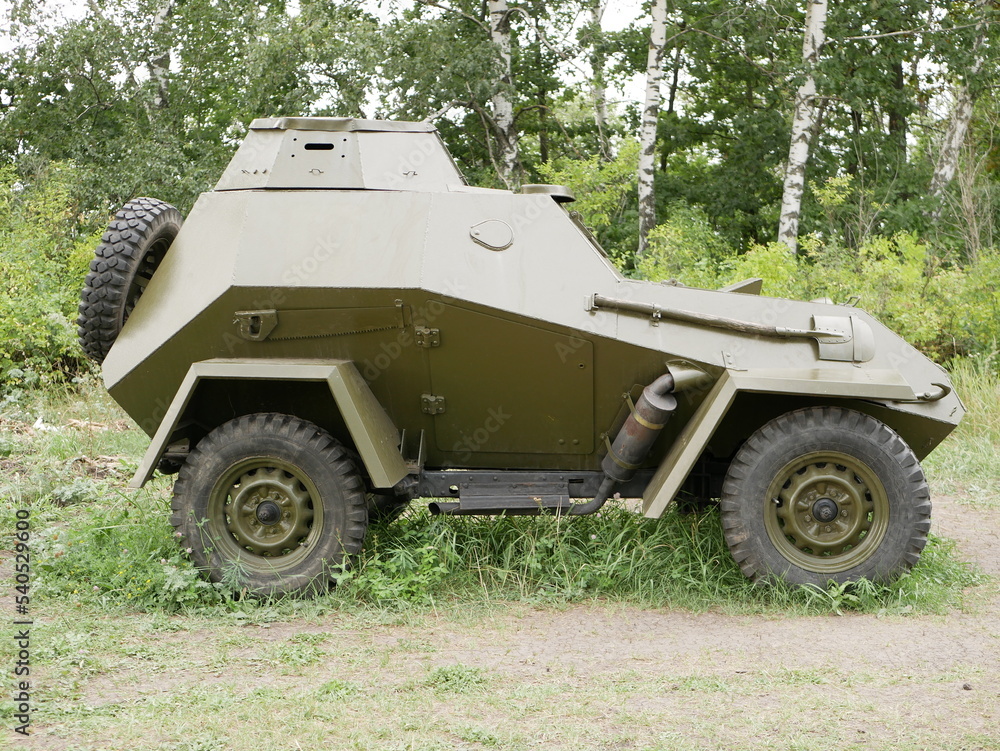 A small four-wheeled armored car with a swivel turret without a machine gun. The use of camouflage on military cross-country vehicles of the Second World War. A small four-wheeled armored car with a swivel turret without a machine gun. The use of camouflage on military cross-country vehicles of the Second World War.