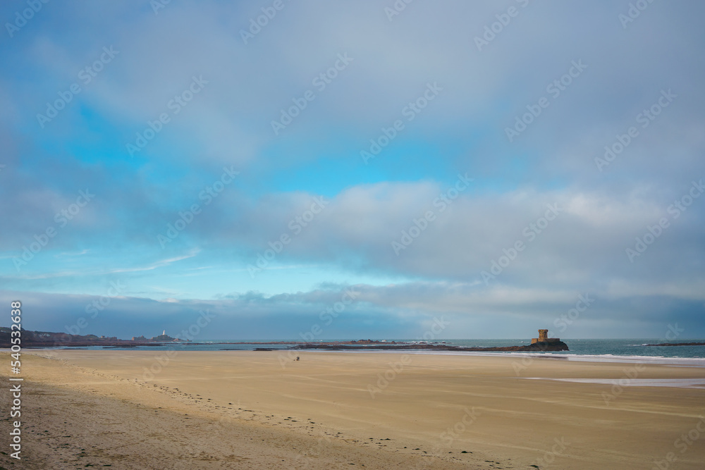 Beautiful view of La Rocco Tower on sunrise from the Le Braye Beach