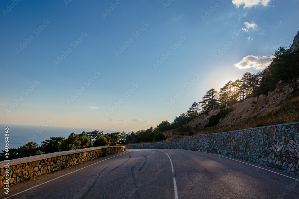 Country mountain road in the evening