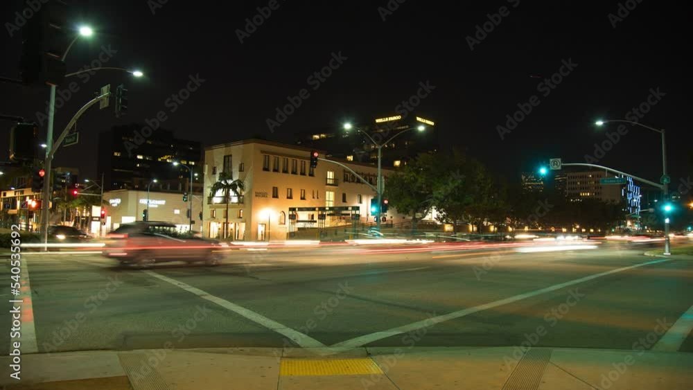 Lockdown Time Lapse Shot Of Pedestrians Crossing Road In City At Night - Santa Monica, California Lockdown Time Lapse Shot Of Pedestrians Crossing Road In City At Night - Santa Monica, California