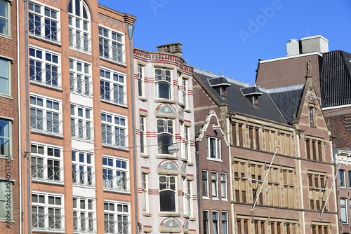 Amsterdam Nieuwezijds Voorburgwal Street Old and New Building Facades View, Netherlands