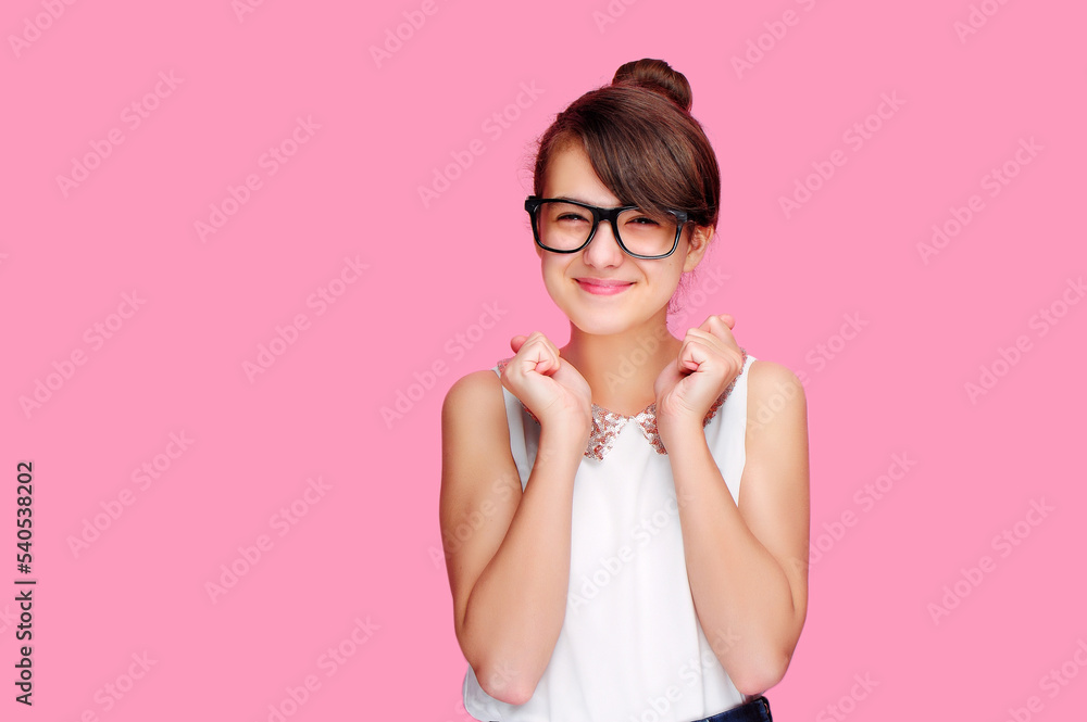 Exchited funny brunette girl isolated on pink Exchited funny brunette girl isolated on pink