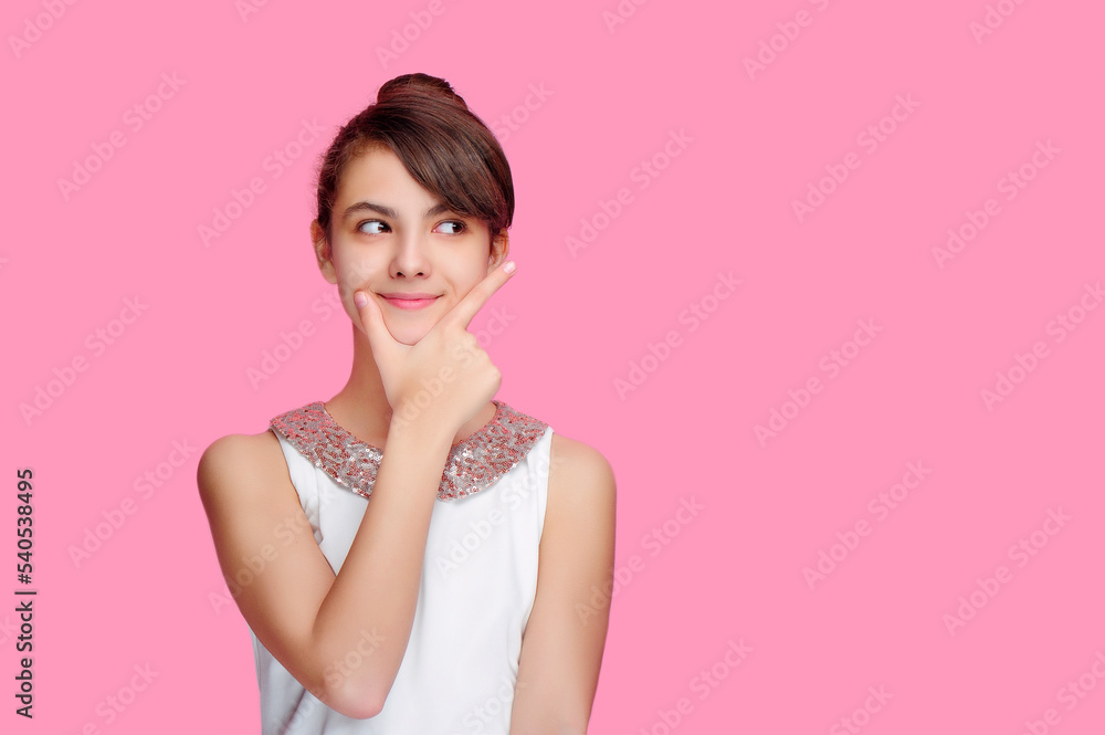 Pretty teen girl making pointing gesture with hand Pretty teen girl making pointing gesture with hand