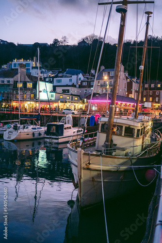 Boats moored at low tide at the St Aubin marina photo