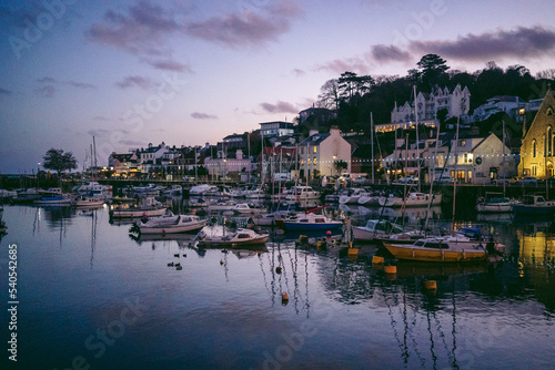 Boats moored at low tide at the St Aubin marina