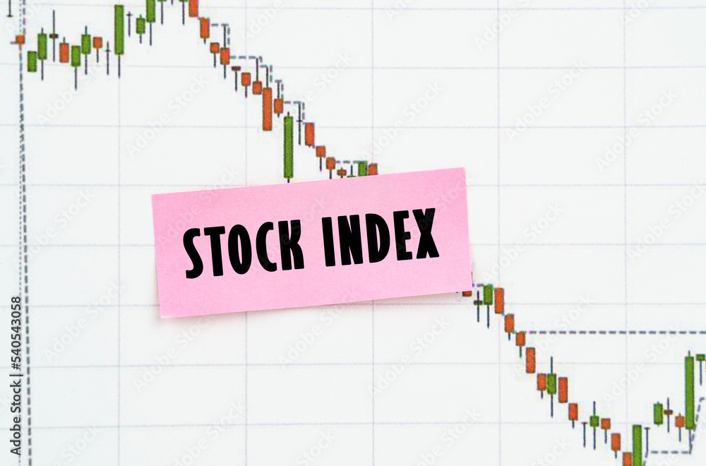 Against the background of the quote chart, a sticker with the inscription - stock index Against the background of the quote chart, a sticker with the inscription - stock index