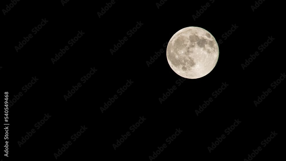 Time Lapse Shot Of Glowing Moon Against Clear Sky At Night - Joshua Tree, California Time Lapse Shot Of Glowing Moon Against Clear Sky At Night - Joshua Tree, California