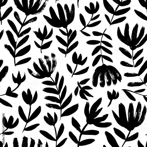 Abstract chrysanthemum blooming seamless pattern. Brush drawn wild flowers on stems with pungent leaves. Vector black flower imprints. Hand drawn botanical ornament with black silhouettes.