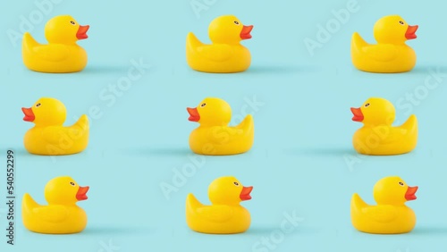 Simple concept with loopable  video of yellow rubber duck toys  4k. photo