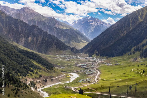 Beautiful Kashmir Landscape. Lush green meadows and mountains of Kashmir photo