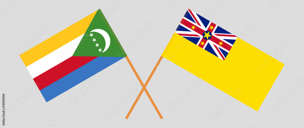 Crossed flags of the Comoros and Niue. Official colors. Correct proportion