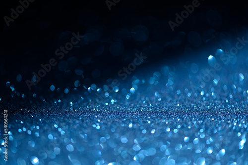 Efectos de luz sobre fondo brillante azul