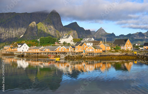 Rorbu, a fisherman cabins, one of the most recognizable symbols of Lofoten, Norway. Distinctive yellow paint and white trim of the rorbu. Sakrisoy Island - scenic Norwegian island  fishing village.