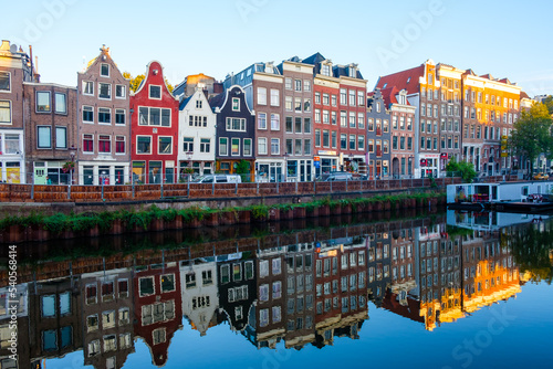 Amsterdam Netherlands - colorful buildings reflected in a canal