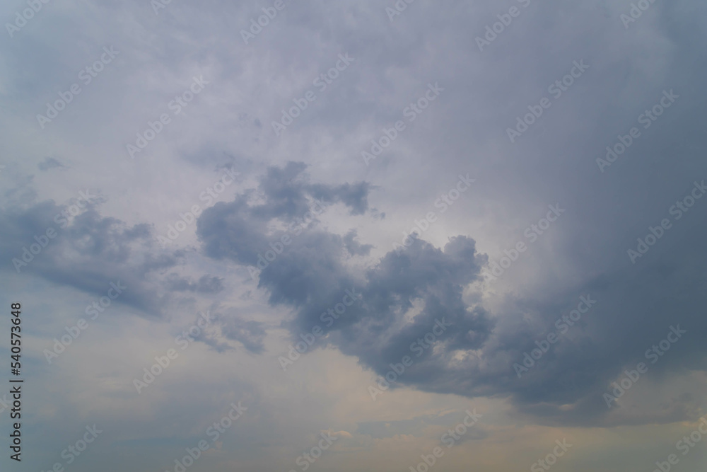 A nimbostratus cloud is a multi-level, amorphous, nearly uniform and often dark grey cloud that usually produces continuous rain, snow or sleet, White gray cloudy sky, Nature background. A nimbostratus cloud is a multi-level, amorphous, nearly uniform and often dark grey cloud that usually produces continuous rain, snow or sleet, White gray cloudy sky, Nature background.