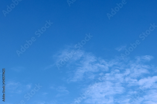 blue fall sky with high wispy clouds