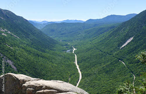 The scenic view of Crawford Notch in the summer from Mt. Willard (2,865 ft) in Carroll County in the White Mountains of NH photo