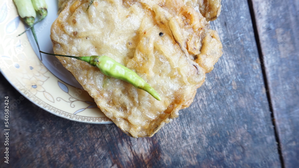 Tempe Mendoan is a kind of tempeh cooking that is made from thin tempeh