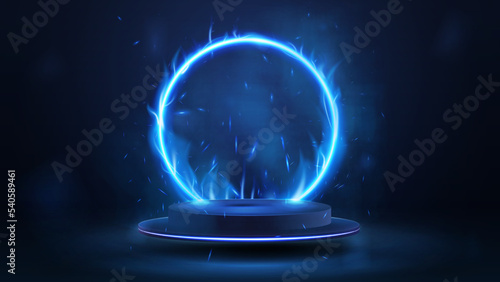 Empty blue podium floating in the air with blue neon fire ring on background