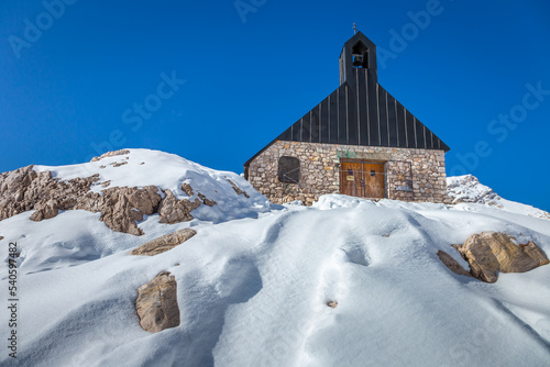 Chapel Maria Heimsuchung in the snow at the mountain zugspitze, Bavaria, Germany © Aide