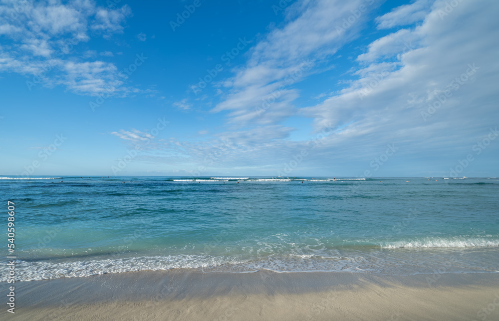 Sandy Beach, Shoreline, Horizon and Blue Sky with Cirrus Clouds.