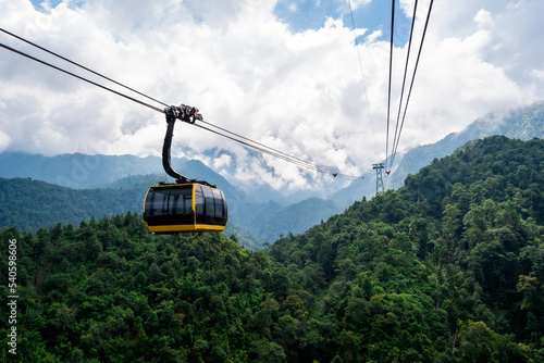The world's longest electric cable car to Fan Si Pan mountain peak the highest mountain of Indochina with mist over the mountains photo