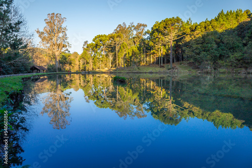Southern Brazil countryside and lake reflection landscape at peaceful sunrise
