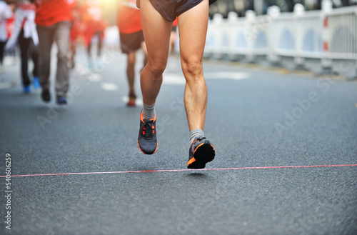 Many running feet of marathon racers