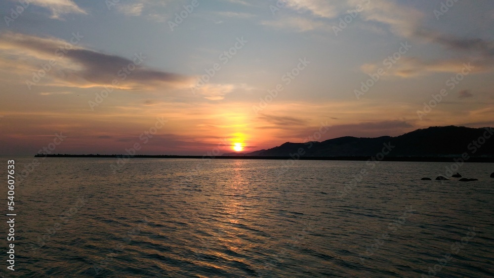 sunset over the sea sunset over the sea
